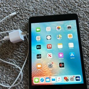 iPad mini 2 with charging cord